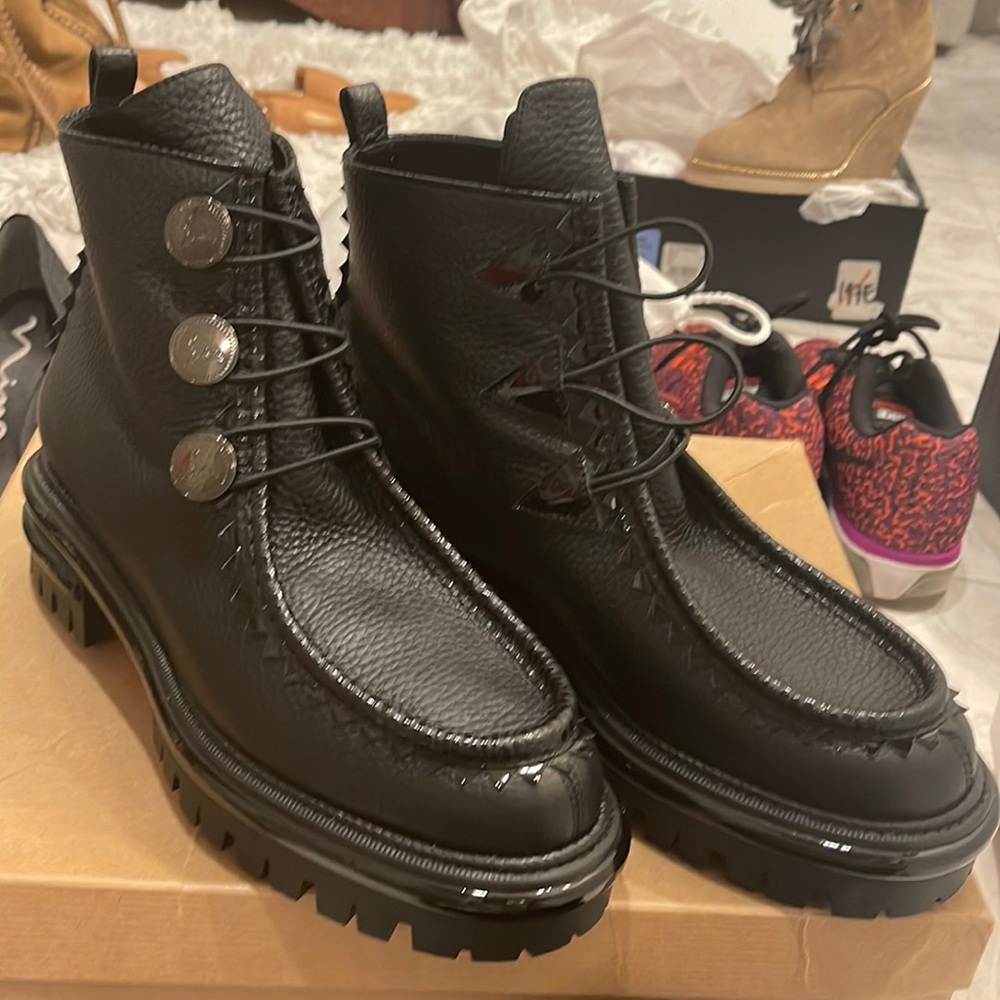 NWT Black Christian Louboutins booties.